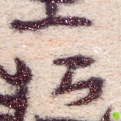 detalle colgante pieza shogi rey reinante de lana afieltrada