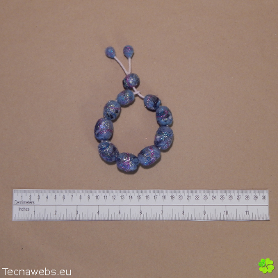 pulsera bocaditos de cielo de lana afieltrada, con referencia