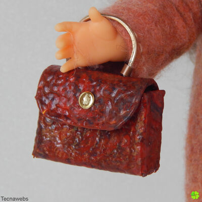 Bolso en mano